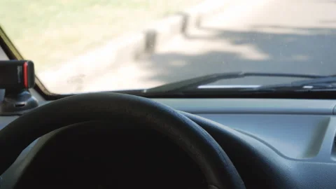 Hands of a man, a guy, a young man on the steering wheel of a car Stock Footage 109607345