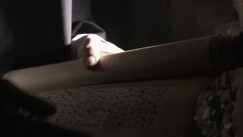 Hands of man holding ancient scroll stored in dark room, 201 AD - Reenactment 스톡 동영상 202896949