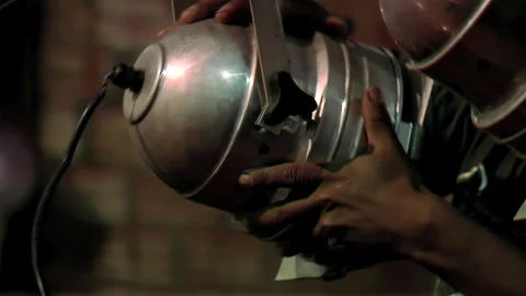 Hands of Man Installing Old Stage Lights in Theater - Close Up   Stock Footage 259835307
