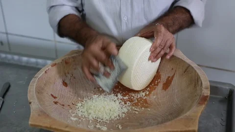 Hands of man making fresh cheese in factory of farm. Stock Footage 128375105