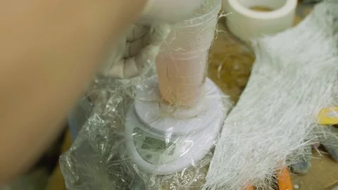 Hands of man making mixture for gel coat Stock Footage 100228721