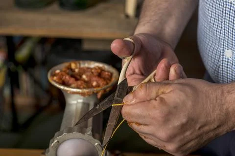 Hands of man making salame Stock Photos