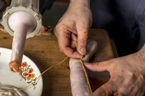 Hands of man making salame Stock Photos