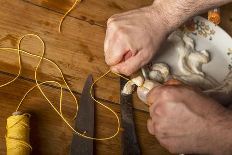 Hands of man making salame Stock Photos