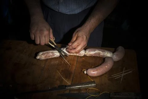 Hands of man making salame Stock Photos