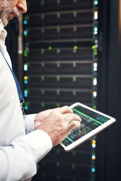 Hands, man or code on tablet screen in server room for CPU usage, track ass.. 库存照片