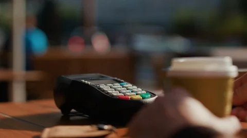 Hands man payment with credit card enter the password customer at cafe finance Stock Footage 115506973