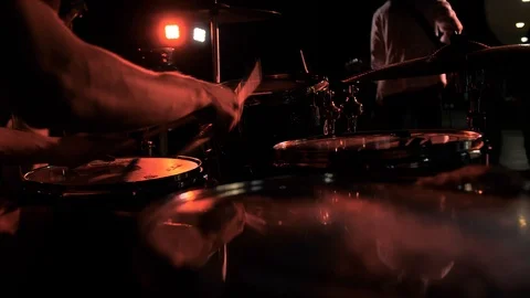 Hands of the man playing a drum set in dark colors Stock Footage 115939038