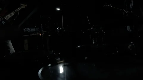 Hands of the man playing a drum set in dark colors Stock Footage 115939765