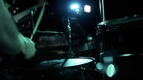 Hands of the man playing a drum set in dark colors Stock Footage 115939802
