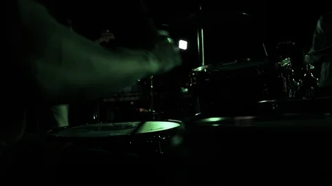 Hands of the man playing a drum set in dark colors Stock Footage 115939989