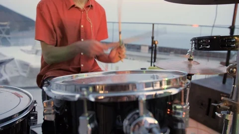 Hands of the man playing a drum set in dark colors Stock Footage 115940102