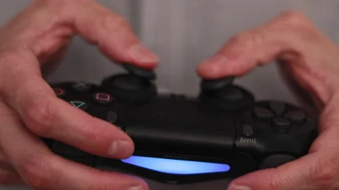 Hands Of A Man Playing A Game Console Stock Footage 158623226