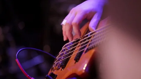 Hands of a man playing the guitar. Stock Footage 74205354