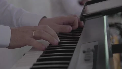 Hands of a man playing piano Stock-Footage 131840503