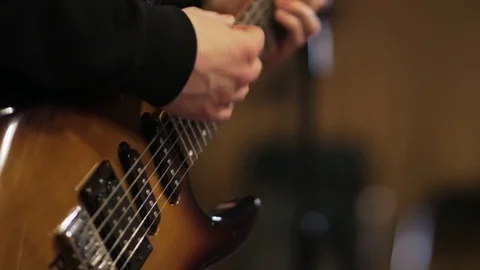 Hands of a Man Playing Vintage Looking Electric Guitar Stock Footage 72158629