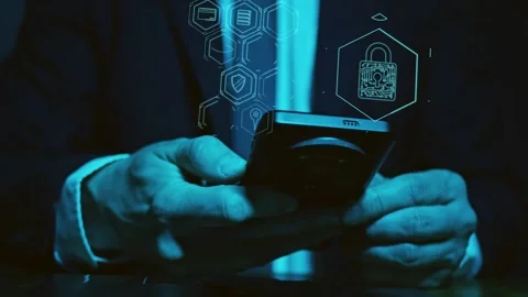 The hands of a man in a suit use a smartphone above which are symbols of Stock Footage 278356522