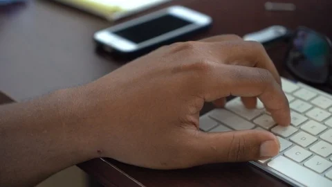 Hands of man typing and using computer mouse Stock Footage 107325835