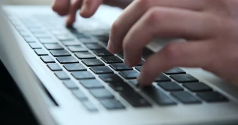 Hands of man typing on laptop Stock Footage 156543571