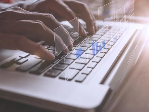 Hands man useing laptop computer with E-commerce technology icons on virtual  Stock Photos