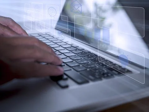 Hands man useing laptop computer with E-commerce technology icons on virtual  Stock Photos
