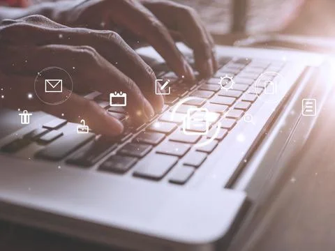 Hands man useing laptop computer with E-commerce technology icons on virtual  Stock Photos