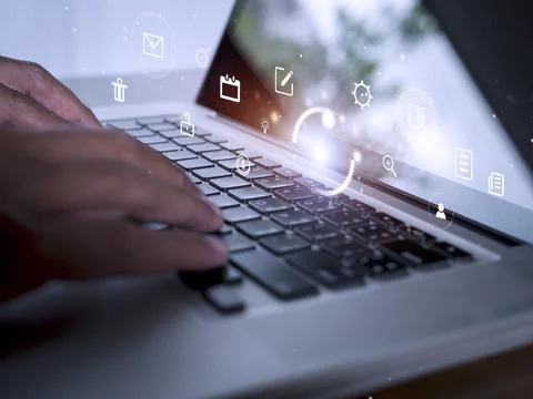 Hands man useing laptop computer with E-commerce technology icons on virtual  Stock Photos