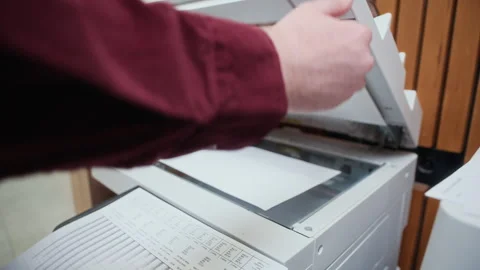 Hands of Man Using MFP to Make Copies of Documents at Office Video stock 312855206