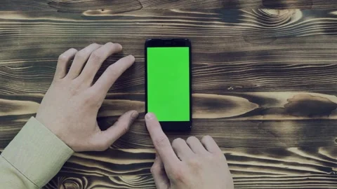 Hands of man using mobile with green screen. Stock Footage 86966583