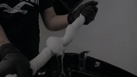 Hands of man washing the head of the client -man in washbasin in barbershop 스톡 동영상 107984699