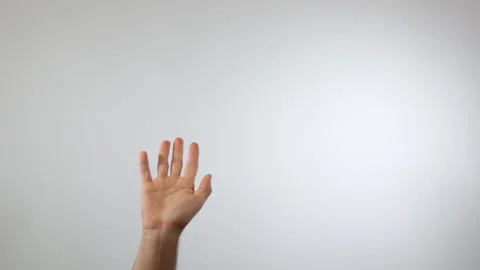 Hands of a man waving or saying goodbye on a white background 動画素材 137426074