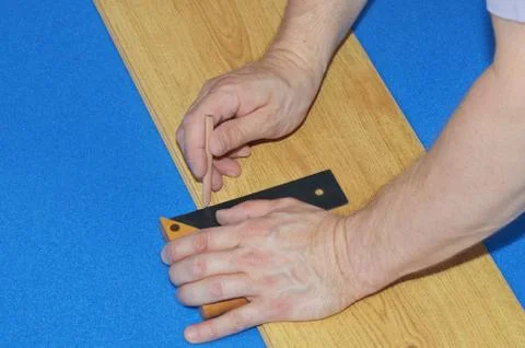 Hands of man while works Stock Photos