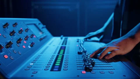 The hands of a man who controls a professional sound controller Stock Footage 203809989
