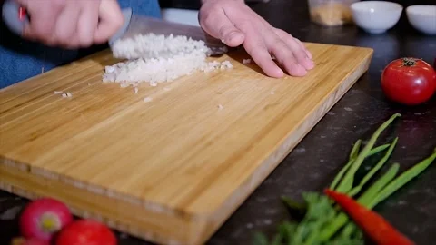 Hands of a man who cuts onions Stock Footage 199016997