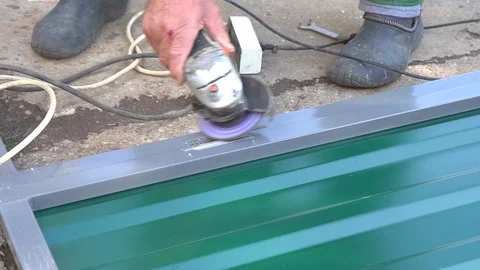 Hands of a man working with a grinder Stock Footage 117370096