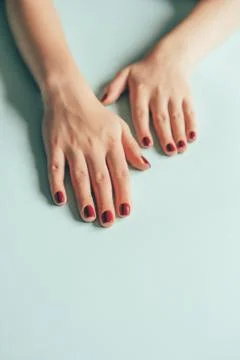 Hands manicure red cherry Stock-Fotos