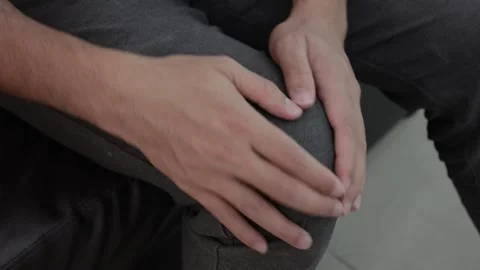Hands massaging knees Video stock 261020357