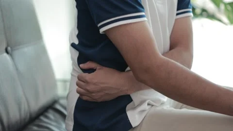 Hands massaging the spine, back pain, waist pain Stock Footage 310864754