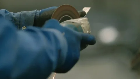 Hands of a Mechanic Grinding a Small Metal Strip Stock Footage 73523368