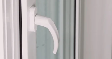 Hands in medical gloves sanitizing window handle Vidéo 130118115