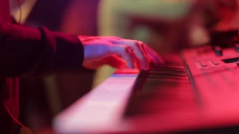 Hands of men play on the synth, on concert. Video stock 72747840