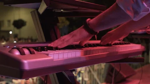Hands of men play on synth piano concert Stock Footage 82842233