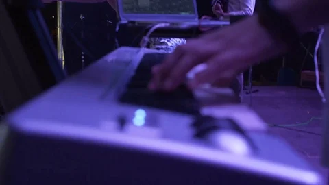 Hands of men play on synth piano concert Stock Footage 82842656