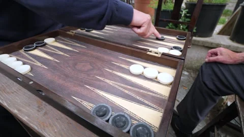 Hands of men playing backgammon Stock Footage 292739296