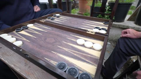 Hands of men playing backgammon Stock Footage 292739829