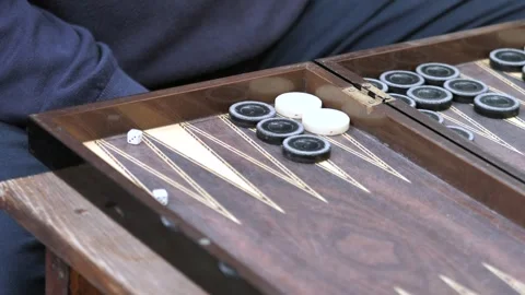 Hands of men playing backgammon Stock Footage 292740018