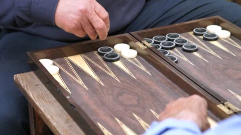 Hands of men playing backgammon Stock Footage 292740064