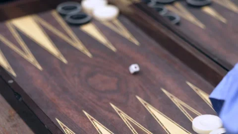 Hands of men playing backgammon Stock Footage 292740117