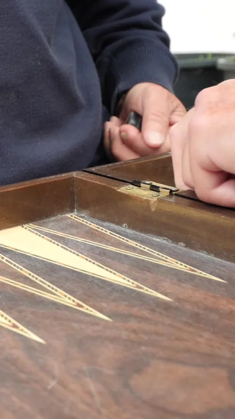 Hands of men playing backgammon Stock Footage 332875693