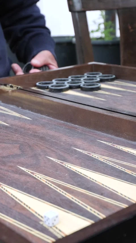 Hands of men playing backgammon Stock Footage 332875748